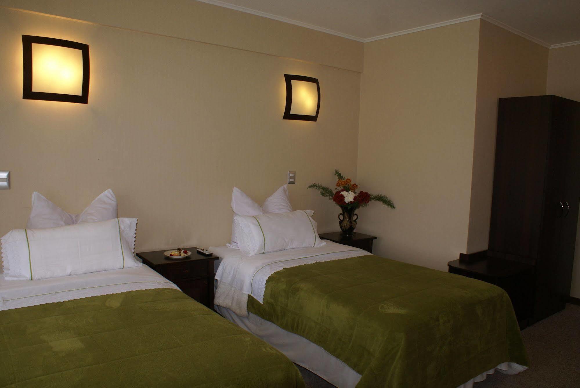 Hotel Baviera Parral Bagian luar foto